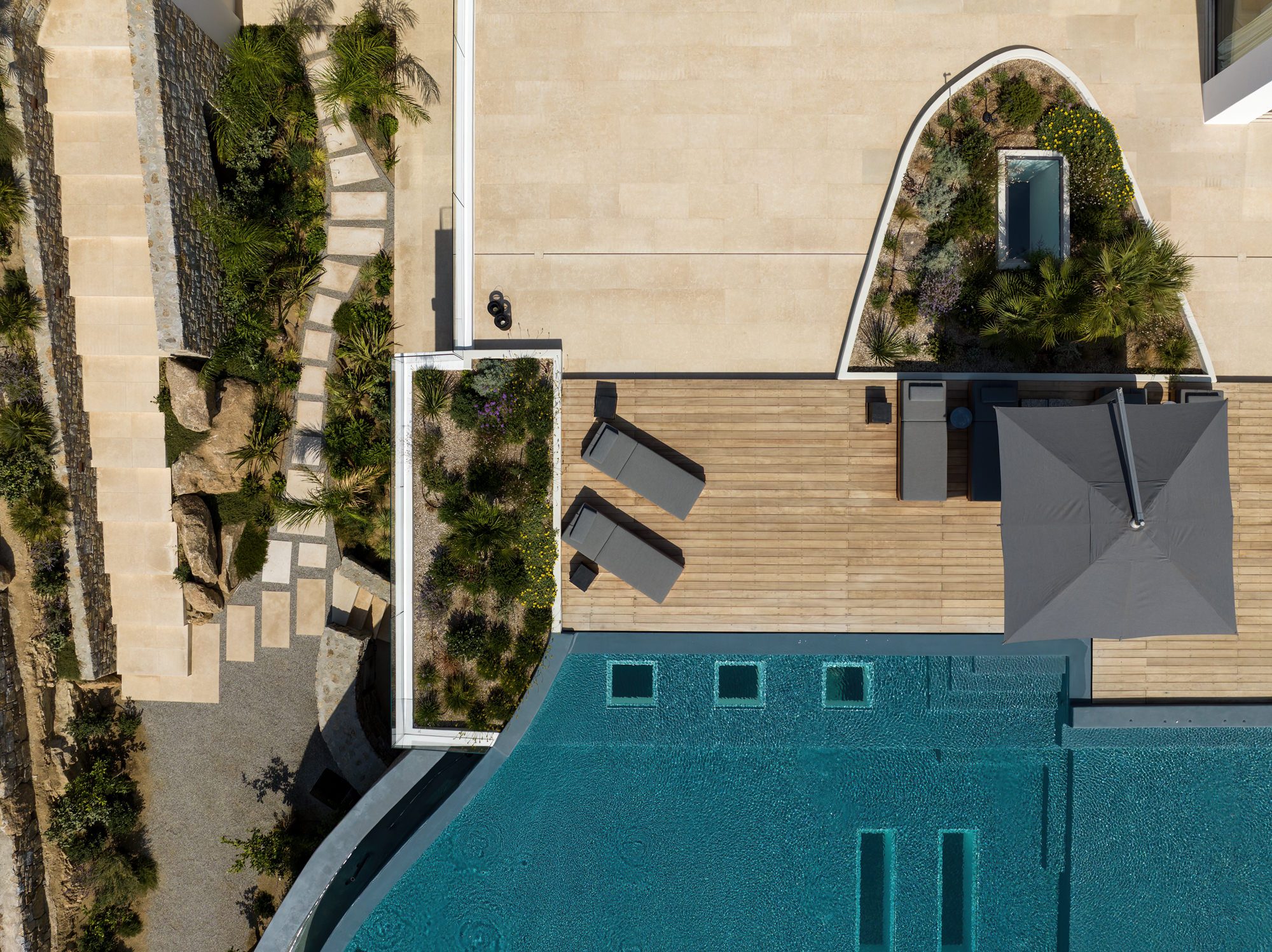 Lithos Residence within the Mykonos landscape