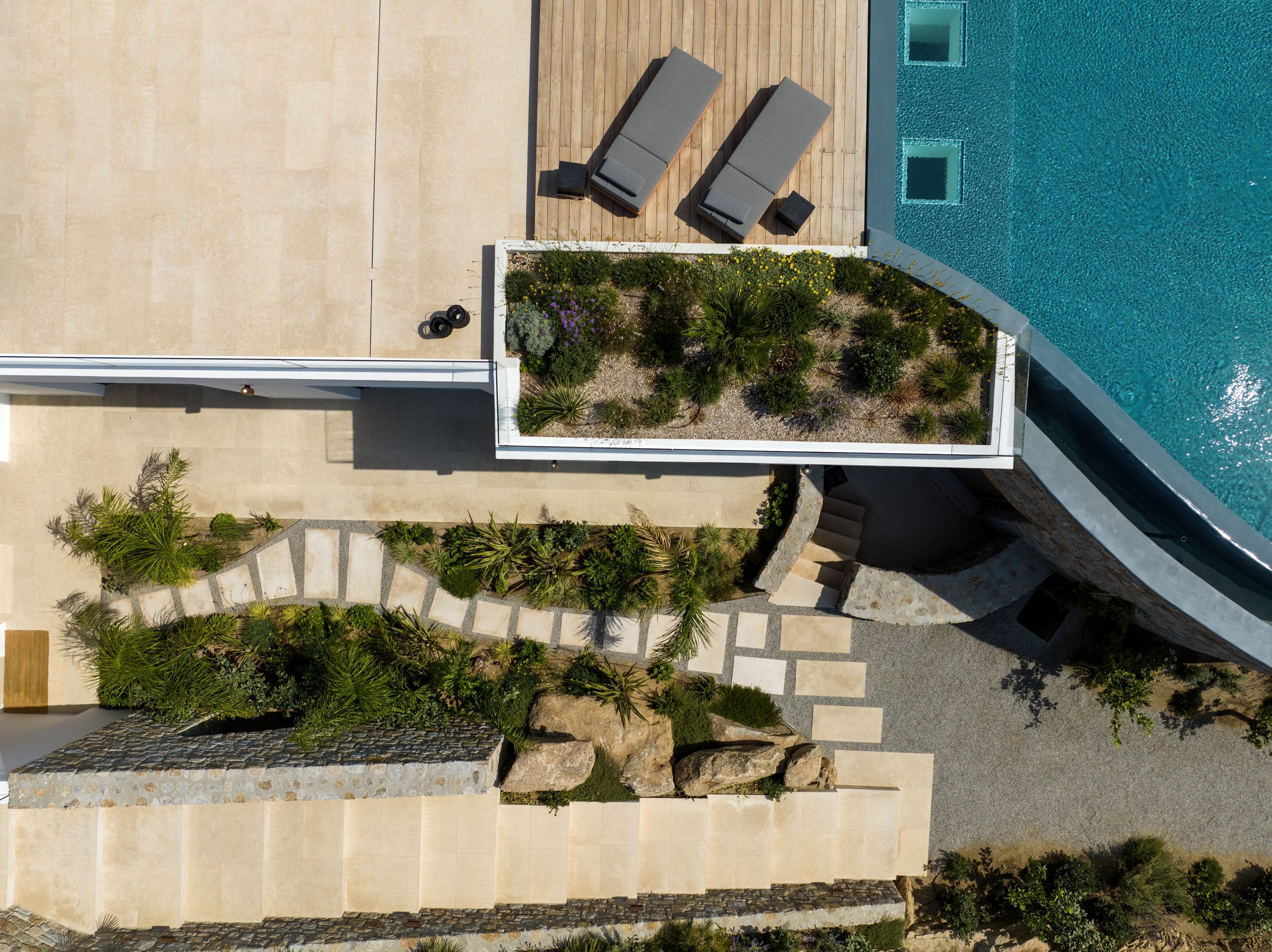Aerial view of the curved pool and terraces